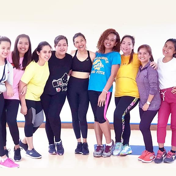 Health and Fitness Coach Mara Pasco with her Pound Fit Class Students